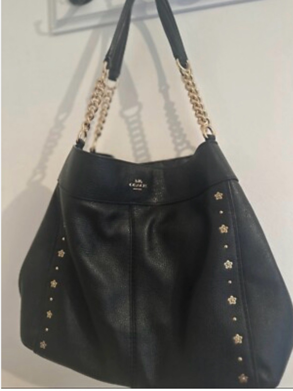 Coach Black Leather Shoulder Bag with Gold Chain Straps and Stud Details